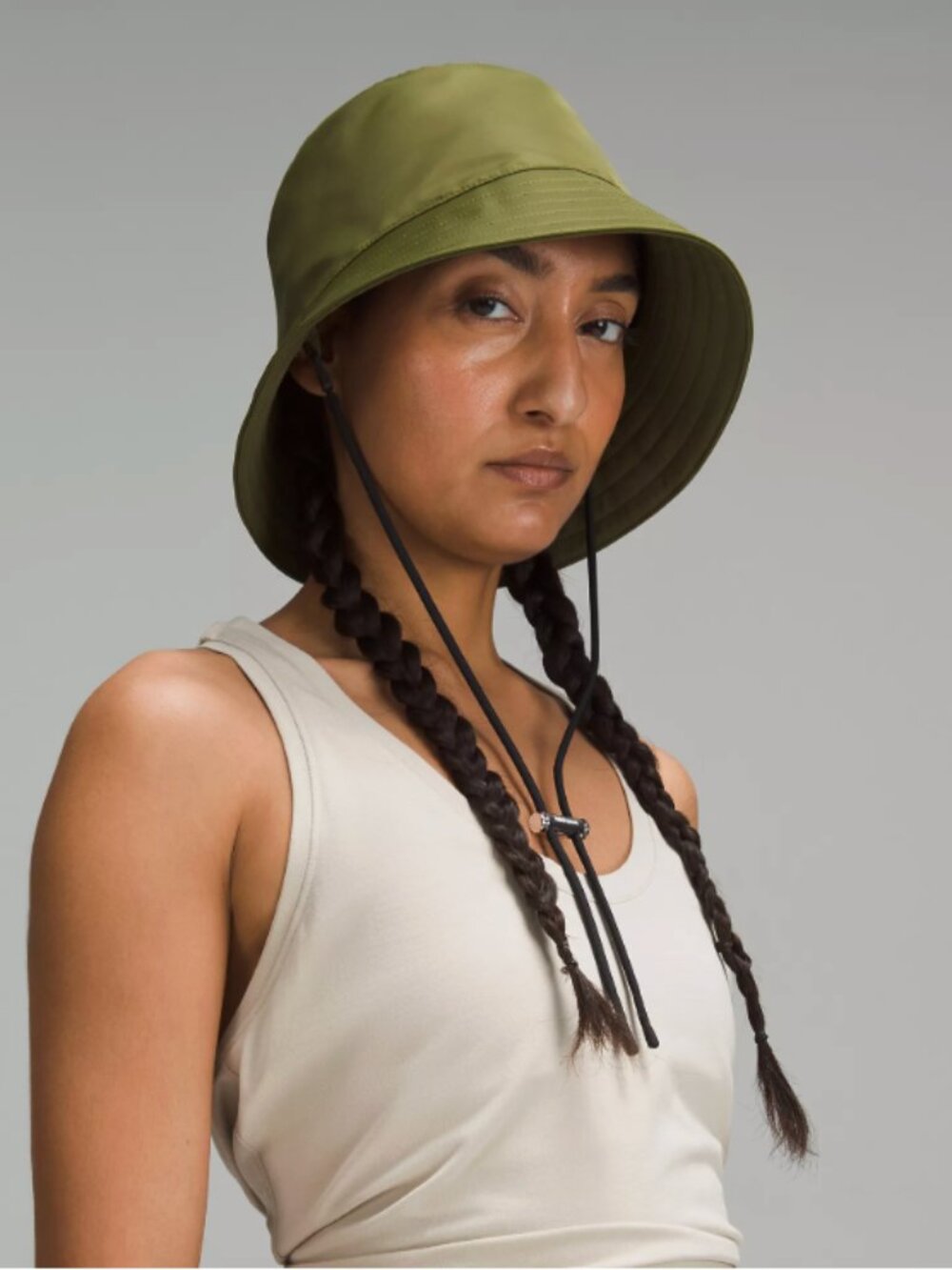 Green Lululemon Nylon bucket hat with drawstring style fastener SIZE M/L